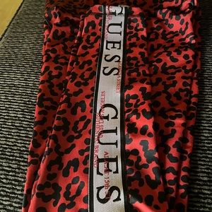 Fairly new worn twice guess spandex pants with jacket Red and black😎